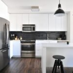 Modern Grand Rapids kitchen with stainless steel refrigerator, range and microwave